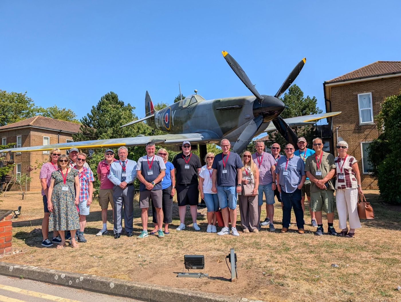 Members, partners and friends in front of the Spitfire at RAF Digby